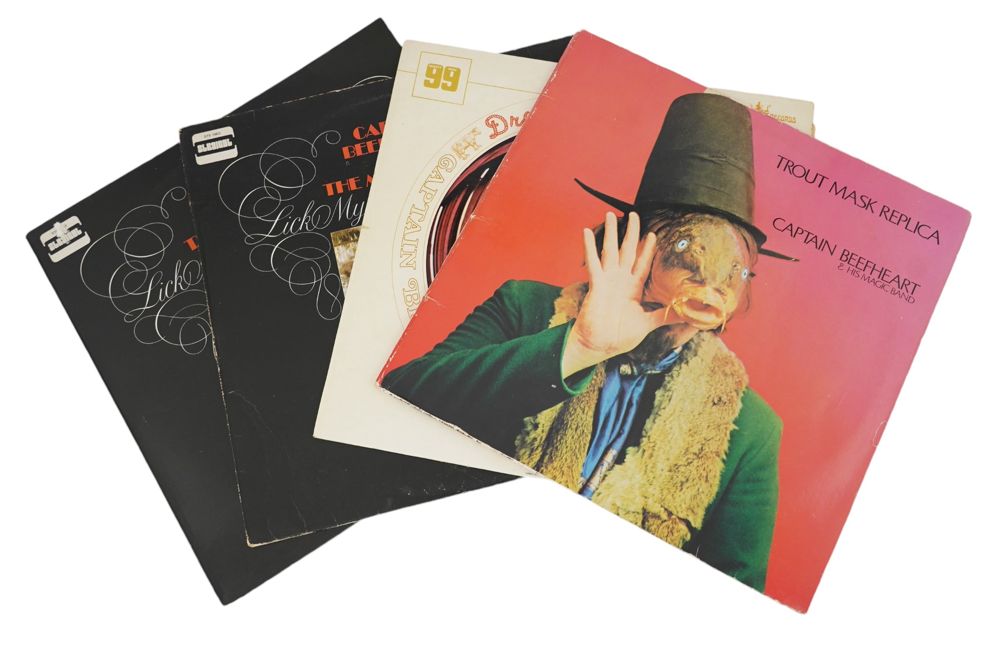 Four Captain Beefheart and His Magic Band LP record albums; Dropout Boogie, stereo on Buddah Records 2349002A, Trout Mask Replica, Lick My Decals Off Baby, and another, both stereo on Straight STS1063. Condition - fair t